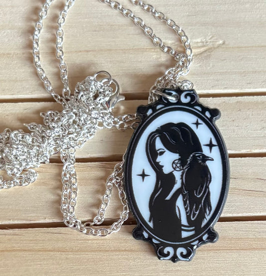 Woman with a raven necklace