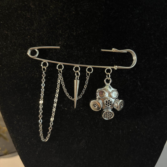 Masky’s brooch